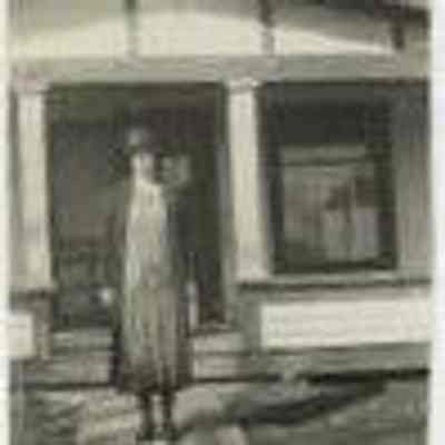 Woman outside house