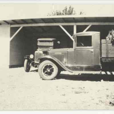 Truck near garage