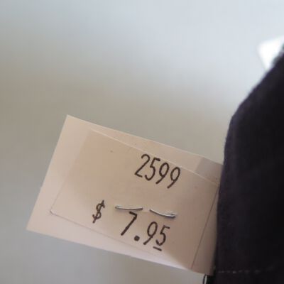 Back of tag in hat.: Origsize: 5" (h) x 9.5" (w) x; Origformat: Artifact
