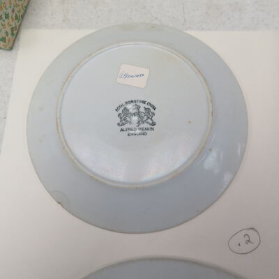 Bottom of small, round plate (b).: Origsize: 1" (h) x 9" (dia); Origformat: Artifact