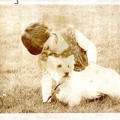 "Dogs Day" - Young girl petting white dog