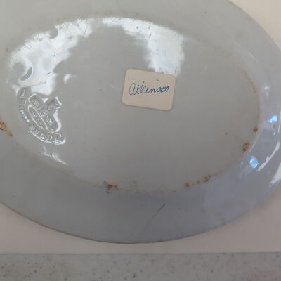 Bottom of oval plate (c).: Origsize: 1" (h) x 9" (dia); Origformat: Artifact