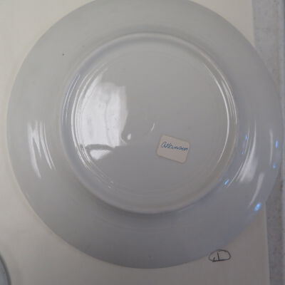 Bottom of large, round plate (a).: Origsize: 1" (h) x 9" (dia); Origformat: Artifact