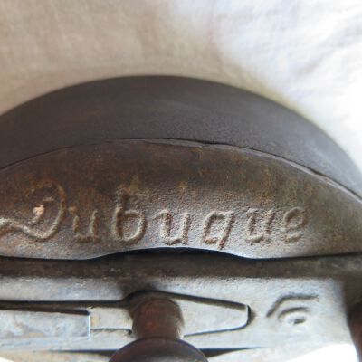 Close up of text on top of iron.: Origsize: 5.5" (h) x 4" (w) x; Origformat: Artifact