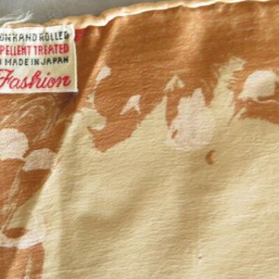 Tag on scarf: Origsize: 8" (w) x 8" (l) fold; Origformat: Artifact