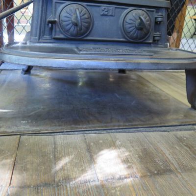 Board under stove.: Origsize: 28" (w) x 28" (l); Origformat: Artifact