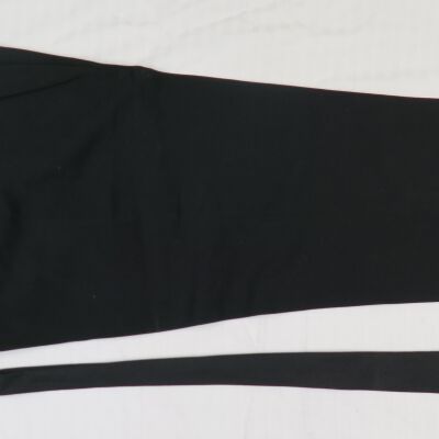 One side of pants and tie.: Origformat: Artifact