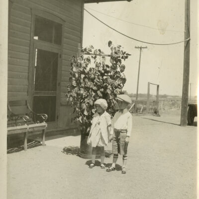 Robert Hillen and Sister Rose Hillen by the Superior Train Depot at Easter