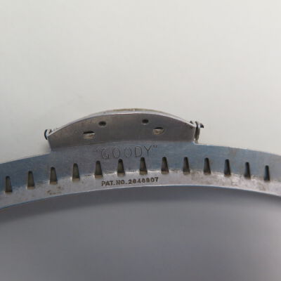 Text on hair clips.: Origsize: 0.5" (w) x 5" (l) an; Origformat: Artifact