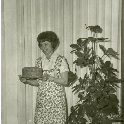 Woman carrying cake