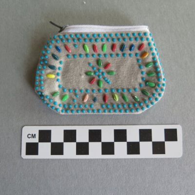 Back of purse: Origsize: 2.5" (h) x 3.5" (w); Origformat: Artifact