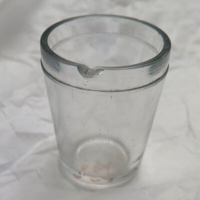 Clear glass with chip: Origsize: 2" (h); Origformat: Artifact