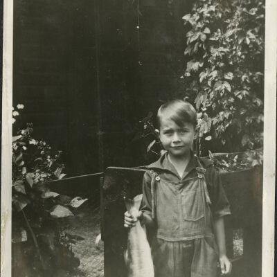 Robert Hillen with fish he caught nearby at Superior Depot, circa 1928: Origsize: 3 1/2" x 5 3/4"; Origformat: Print-Photographic; Resolution: 300dpi