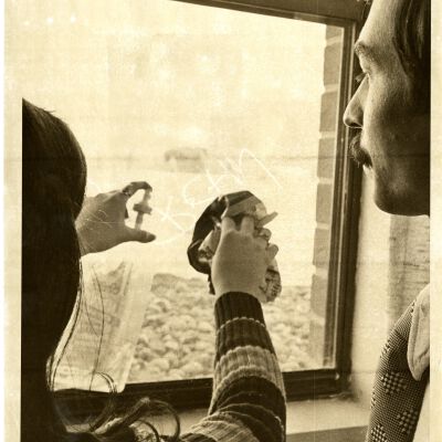 "One of the youth" and "A new approach" - Man watching young woman clean window