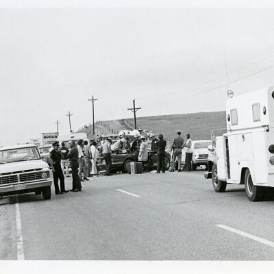 Emergency personnel working at a car accident, Highway 287