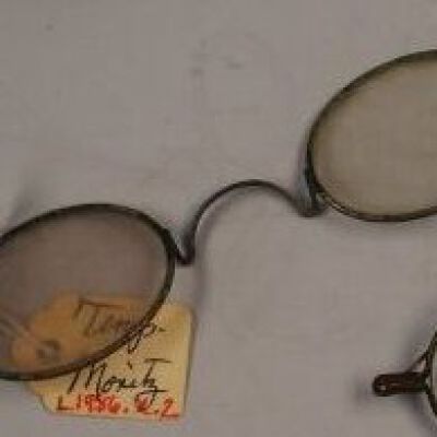 Eyeglasses in the back: Origsize: 5" (w) x 1.5" (d); Origformat: Artifact