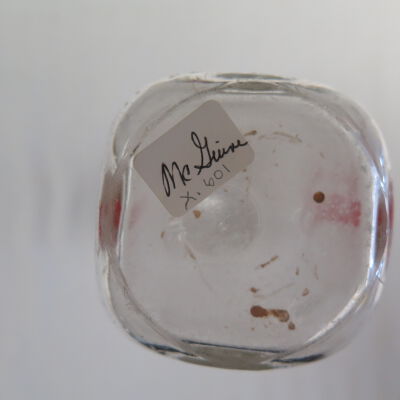 Bottom of milk bottle.: Origsize: 7" (h) x 2.5" (dia); Origformat: Artifact