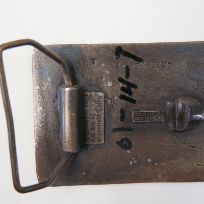 Back of belt buckle: Origsize: 2.25" (h) x 3" (w); Origformat: Artifact
