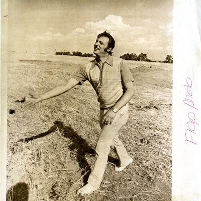 "George" - Man pitching something