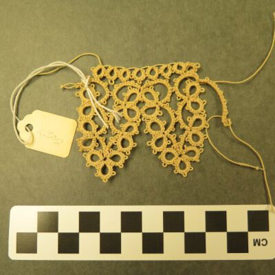 Other side of lace.: Origsize: 2" (w) x 2.5" (l); Origformat: Artifact
