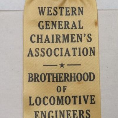 Front of nametag and ribbon: Origsize: 2.25" (w) x 6" (l); Origformat: Artifact