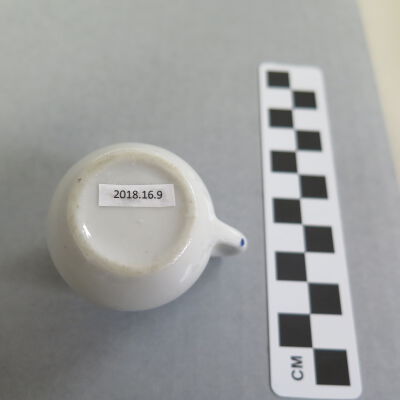 Bottom of pitcher.: Origformat: Artifact