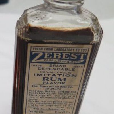 Bottle with liquid Imitation Rum: Origsize: 5" (h) x 2" (w) x 0.; Origformat: Artifact