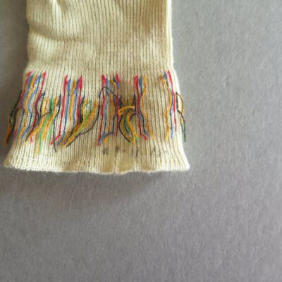 Number of socks: Origsize: 2" (w) x 7" (l); Origformat: Artifact