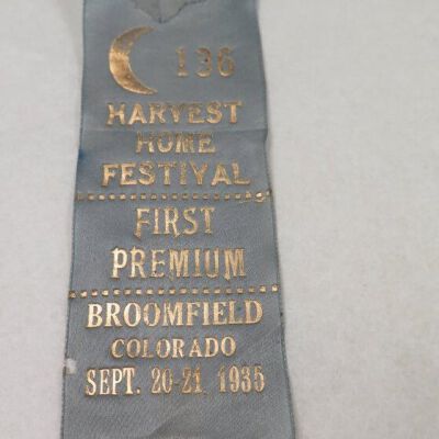 Front of ribbon: Origsize: 6" (l) x 2" (w); Origformat: Artifact