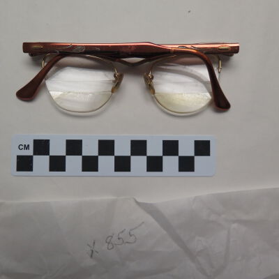 Back of eyeglasses.: Origsize: 0.5" (h) x 6.25" (w); Origformat: Artifact