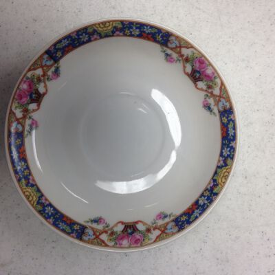 Front of one saucer: Origsize: 1.25" (h) x 5.75" (d; Origformat: Artifact