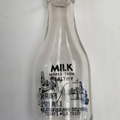 Other side of milk bottle.: Origsize: 9.5" (h) x 3.5" (dia; Origformat: Artifact