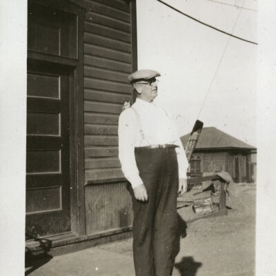 Station Agent Robert Hillen with Pet Canary by Superior Depot Telegraph Office