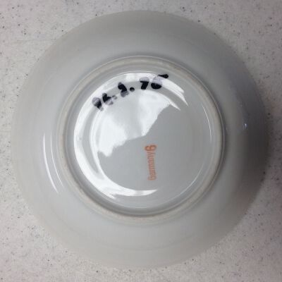 Back of one saucer: Origsize: 1.25" (h) x 5.75" (d; Origformat: Artifact