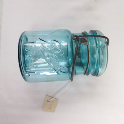 Side of jar.: Origsize: 5.5" (h) x 3.5" (dia; Origformat: Artifact