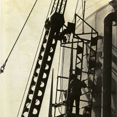 Worker on a crane at Broomfield water reservoir, circa 1970: Origsize: 8" x 10"; Origformat: Print-Photographic; Resolution: 500dpi