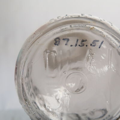 Number on bottom of milk bottle.: Origsize: 9.5" (h) x 3.5" (dia; Origformat: Artifact