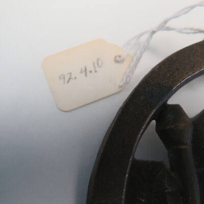 Number on tag attached to trivet.: Origsize: 0.5" (h) x 6.5" (dia; Origformat: Artifact