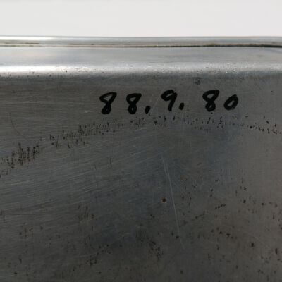 Back of pan: Origsize: 1" (h) x 9.5" (w) x; Origformat: Artifact
