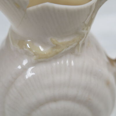 Damage on side of pitcher.: Origsize: 3.5" (h) x 3.25" (w); Origformat: Artifact