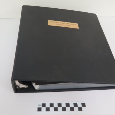 Side of photo album: Origsize: 11" (w) x 11.5" (l); Origformat: Artifact