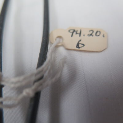 Number on fly swatter.: Origsize: 4.5" (w) x 22" (l); Origformat: Artifact