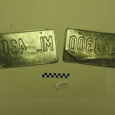 Back of license plates.: Origsize: 6" (h) x 12.25" (w); Origformat: Artifact