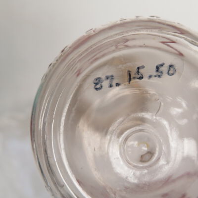 Bottom of milk bottle.: Origsize: 10" (h) x 3.5" (dia); Origformat: Artifact