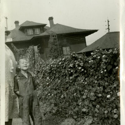 Robert Hillen and Jeannie Hillen by Clematis Flowers at Superior Train Depot