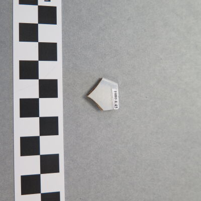 Back of fragment.: Origsize: .75" (w) x .75" (l); Origformat: Artifact