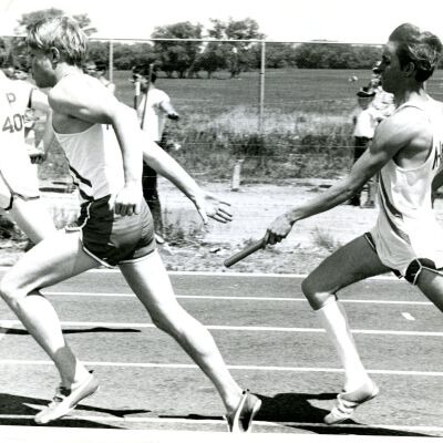 Broomfield High School Track and Field - Relay handoff