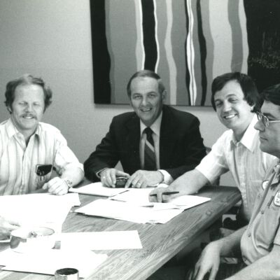 Men Sitting at Table
