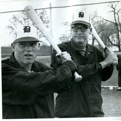 Broomfield Eagles High School Baseball - Two men holding bats