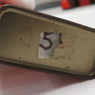 Bottom of tin showing number: Origsize: 3" (h) x 2.25" (w) x; Origformat: Artifact